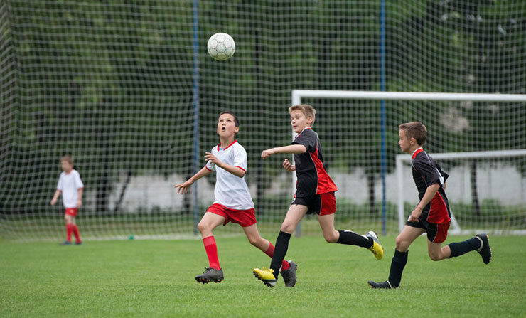 Boys playing soccer