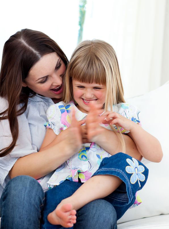 mother and daughter laughing